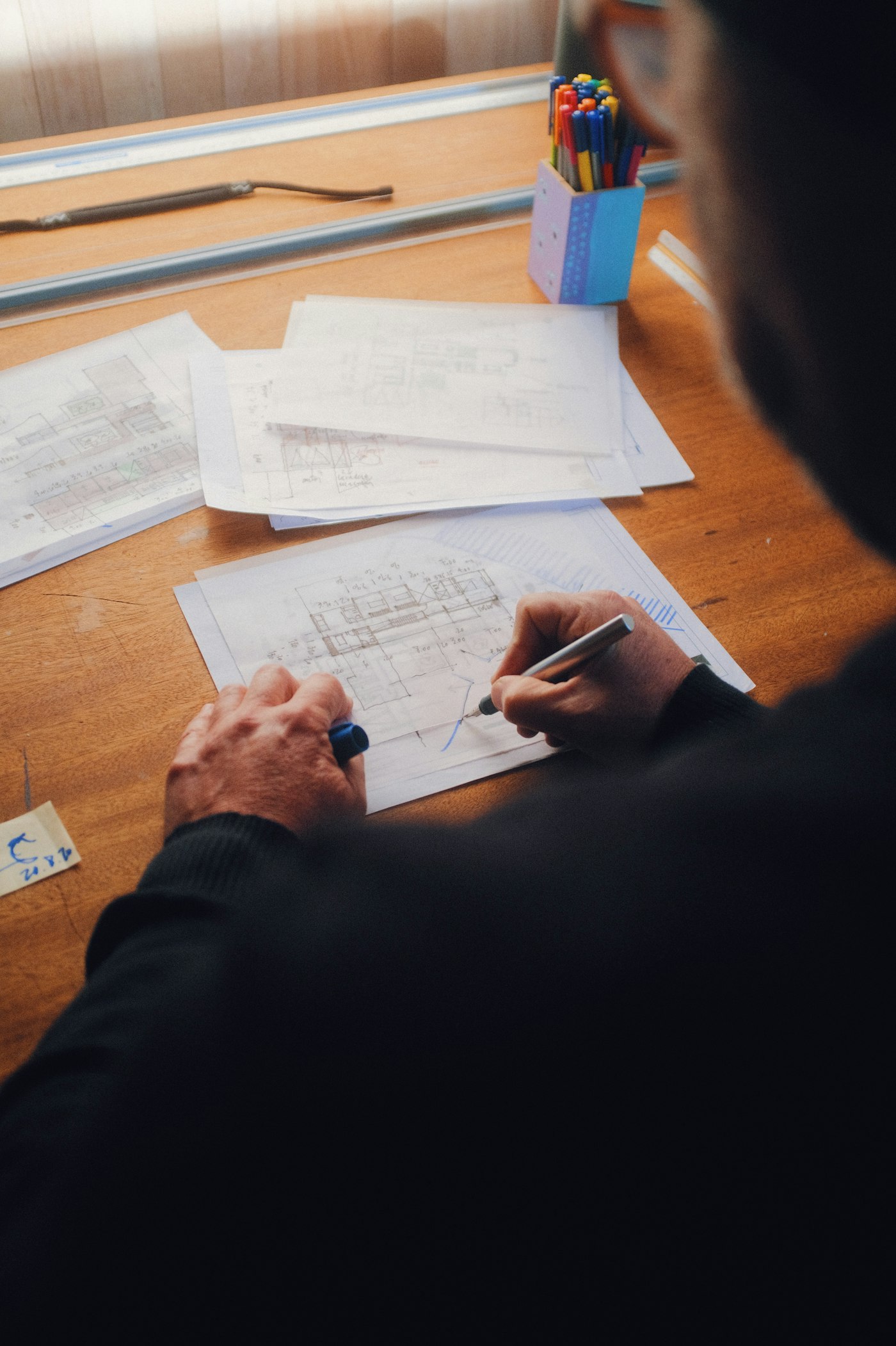An architect working on drawings